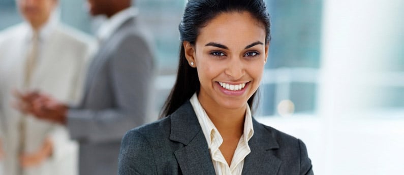Woman smiling in a business suit
