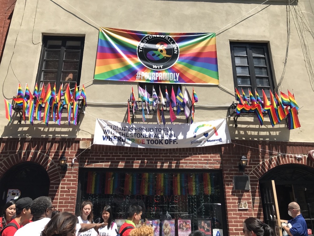 A rainbow flag above the LIBI entrance