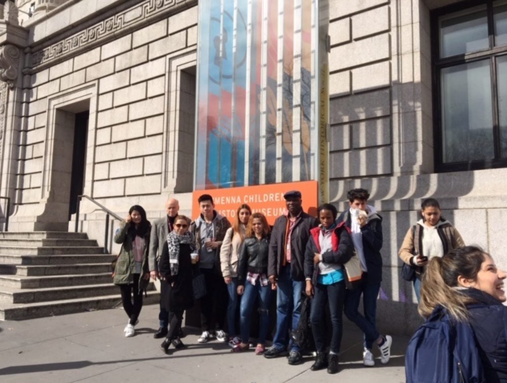A group of students outside of a museum